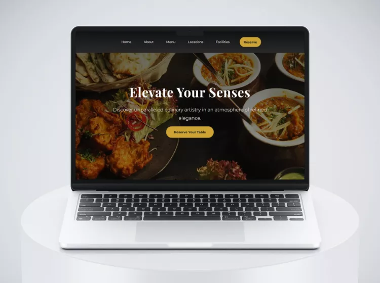 Restaurants Landing Page template by Ak Development. Promotional Mockup of a laptop showing the hero section of the landing page.